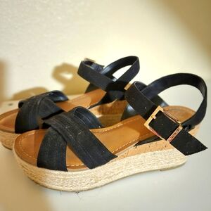Tan wedge sandals with black straps